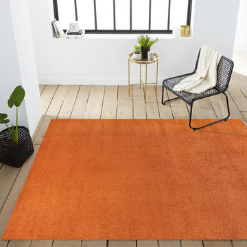 Haze Solid Low-pile Area Rug Orange